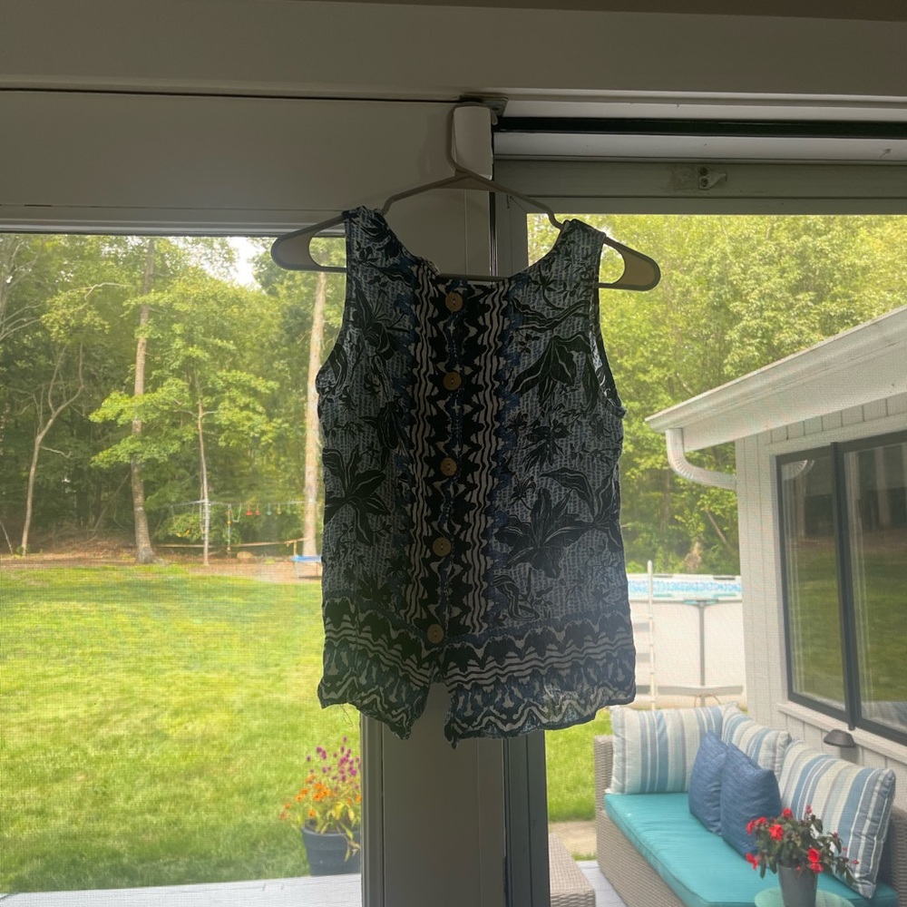 Blue tank top.